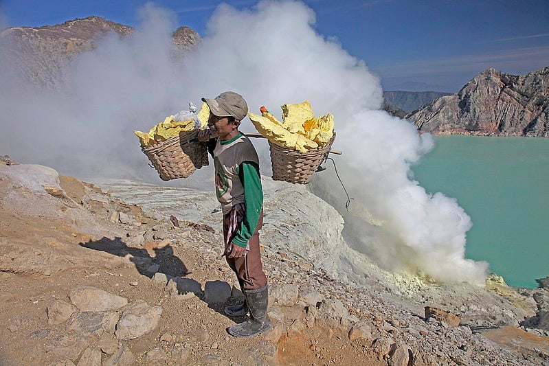 Working the sulphur mines located in the crater of Kawah Ijen in East Java